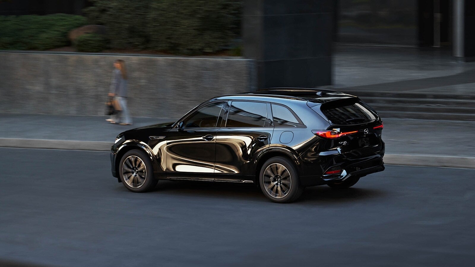black CX-70 driving downtown from Fitzgerald Mazda Frederick in Frederick MD 