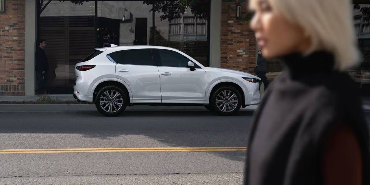 a white CX-5 parked downtown from Fitzgerald Mazda Frederick in Frederick MD 